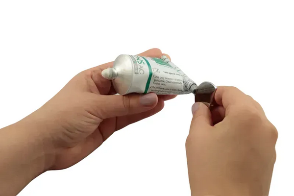 Tubenschlüssel für Elektrodencreme, Pasten oder ähnliches